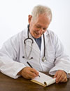Dr. writing prescription for physical, occupational, and/or speech therapy
